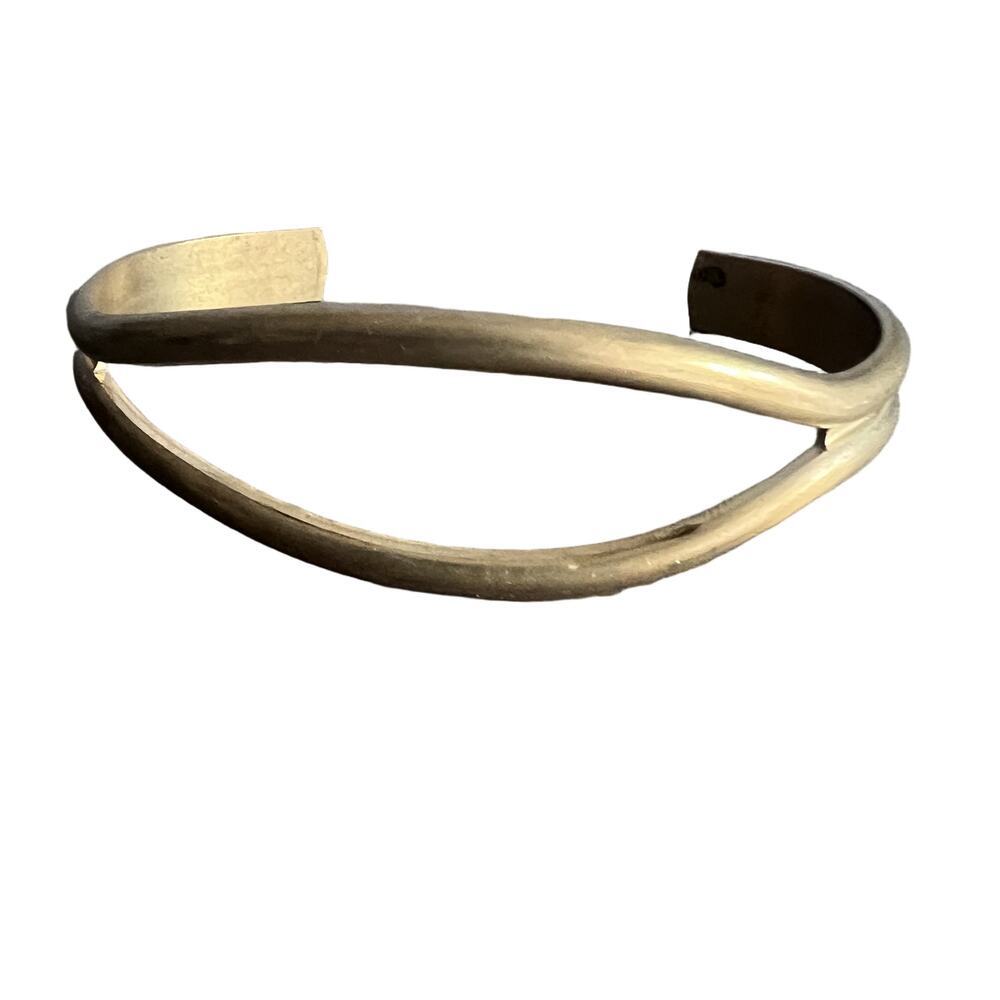 Semi distressed bronze gold tone open metallic cuff bracelet
